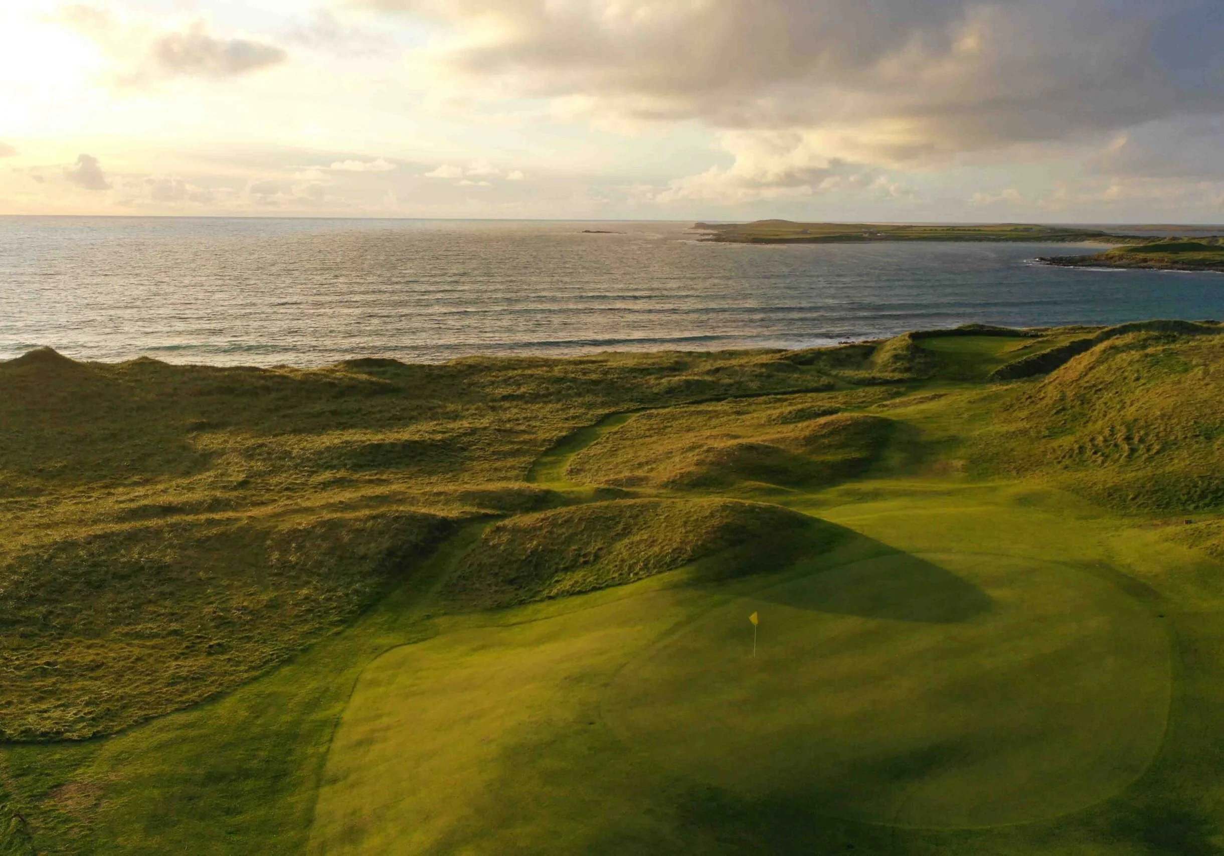 Carne Golf Links aerial view at sunrise